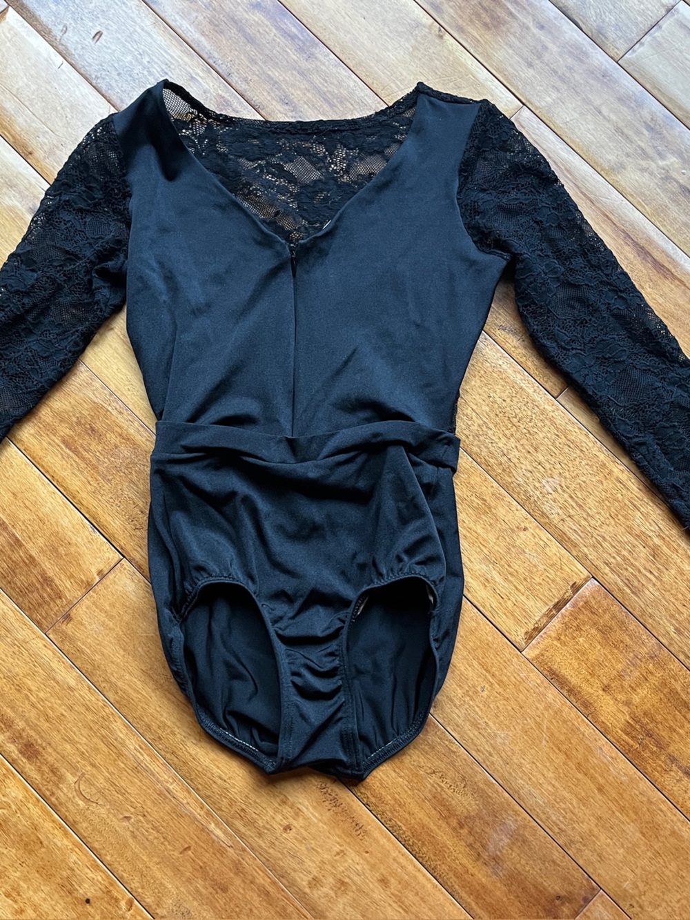 EUC Black leotard with lace sleeves and back and zip up front size adult M
